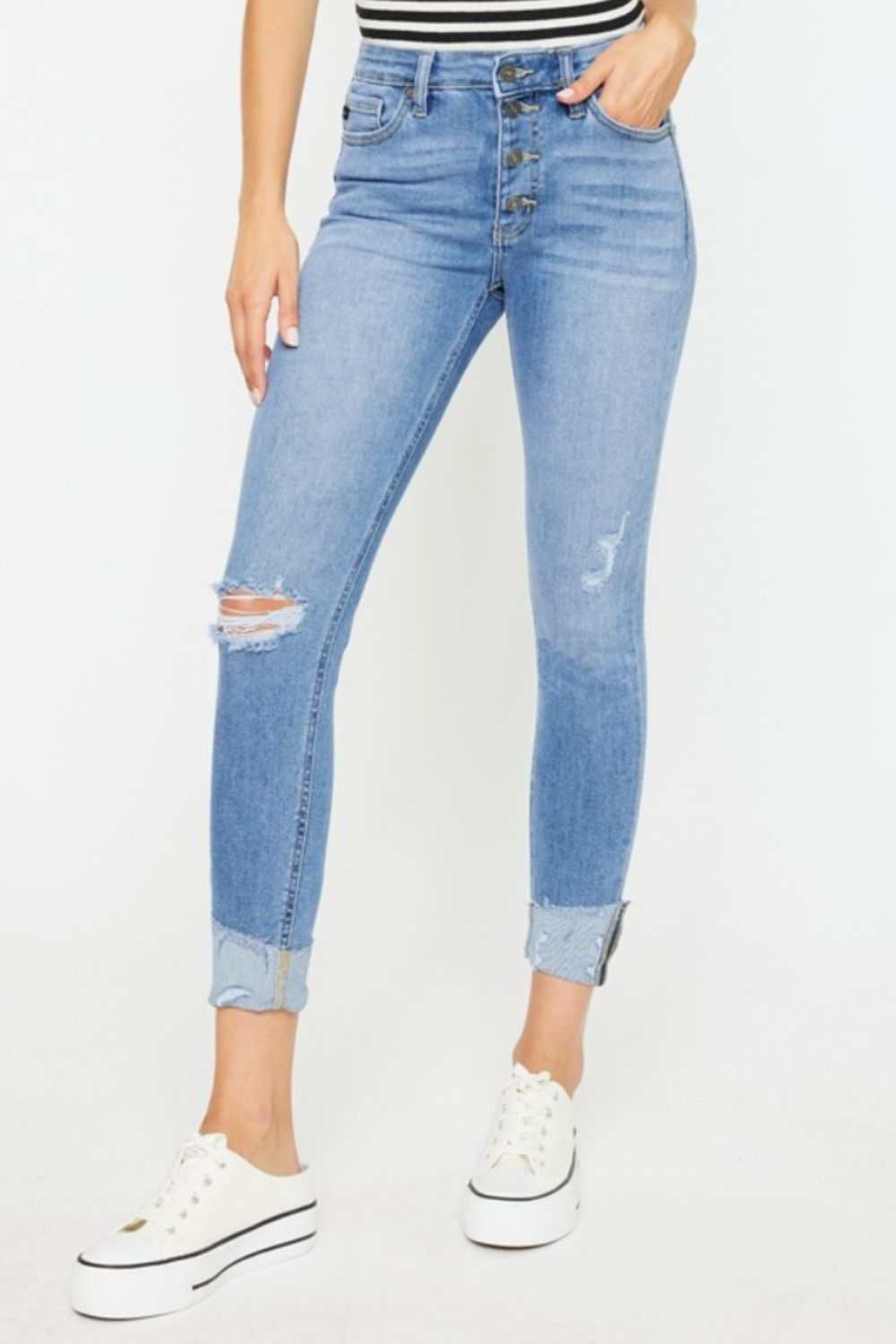 Kancan Distressed Cat's Whiskers Button Fly Jeans with ripped detailing, button closure, and folded cuffs.