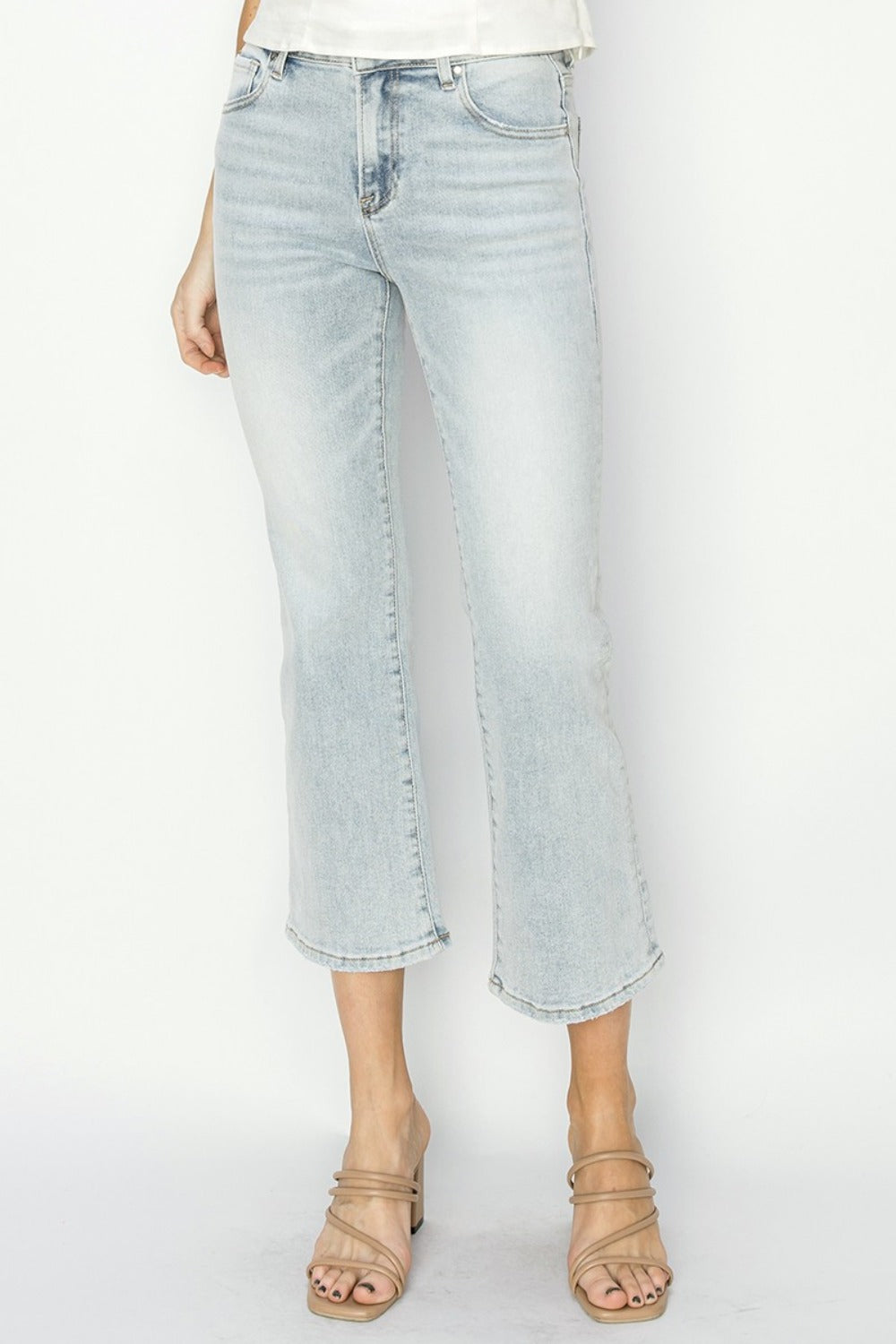 Mid-rise cropped flare jeans, highlighting footwear, RISEN Full Size.