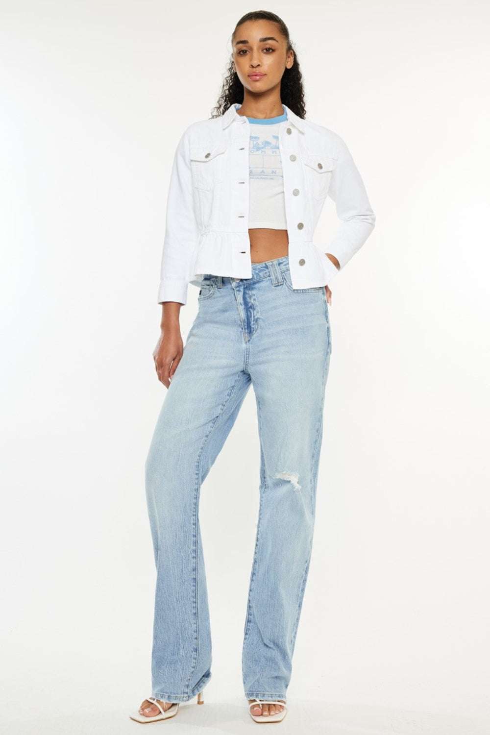Kancan distressed high waist straight jeans in light blue with pocket details, slightly stretchy fabric.