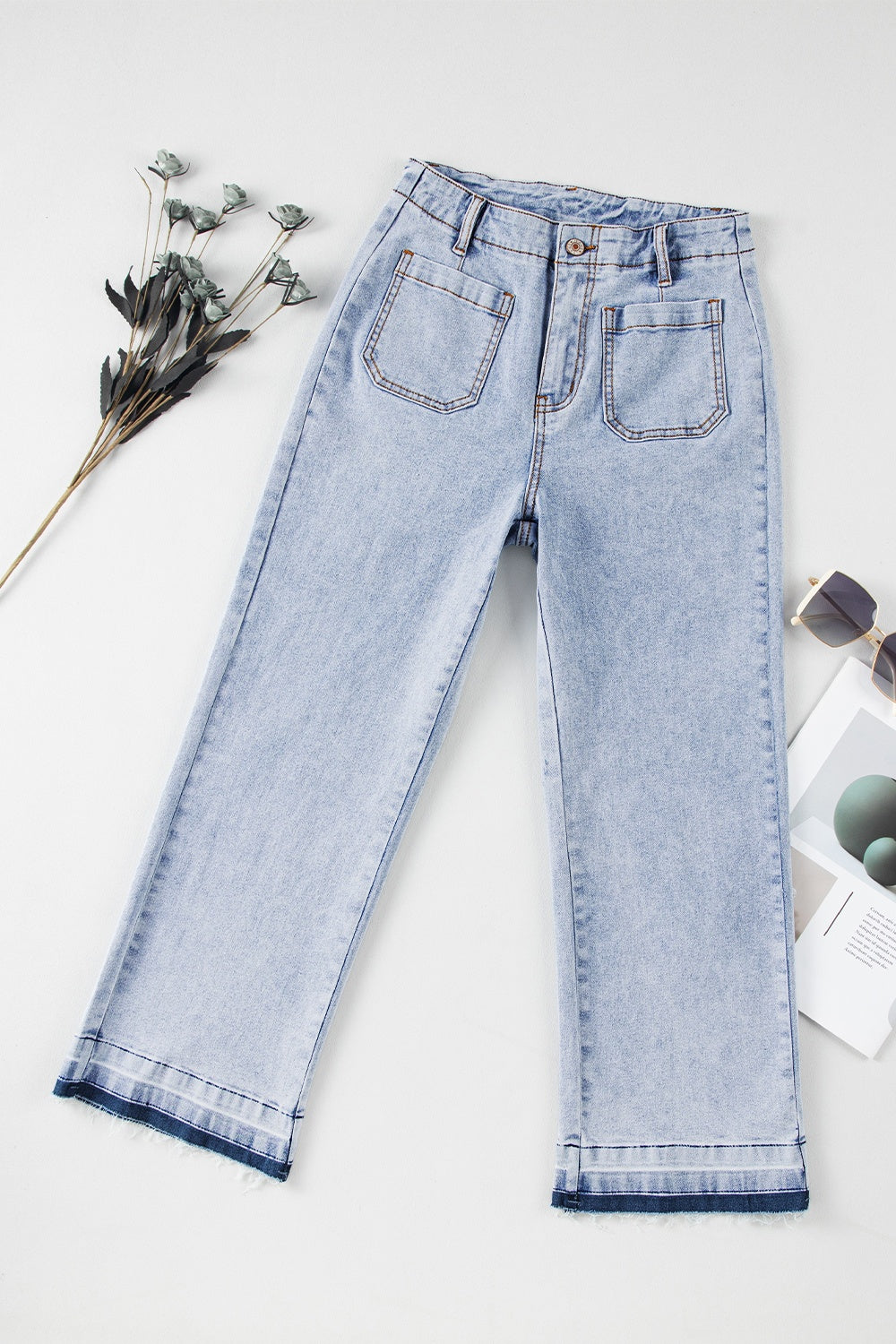 Raw hem straight jeans with pockets in light denim.
