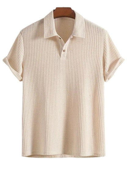 Men's waffle-knit collared neck short sleeve polo in cream color.