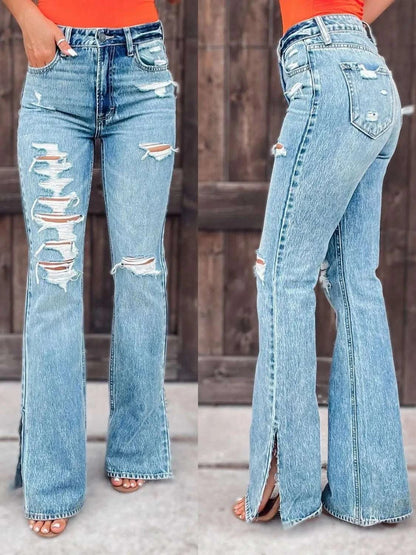 Distressed slit bootcut jeans with buttoned pockets and slightly stretchy fabric.