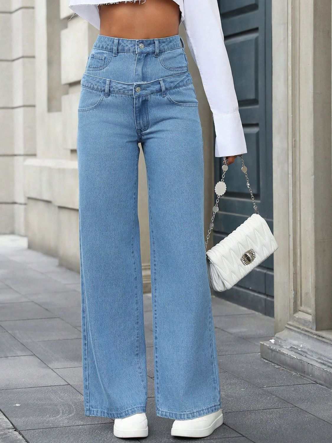 Faux Layered High Waist Jeans with pockets and button detail, slightly stretchy fabric.