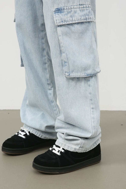 Men's wide leg jeans with cargo pockets, light wash, no stretch, cotton blend material.