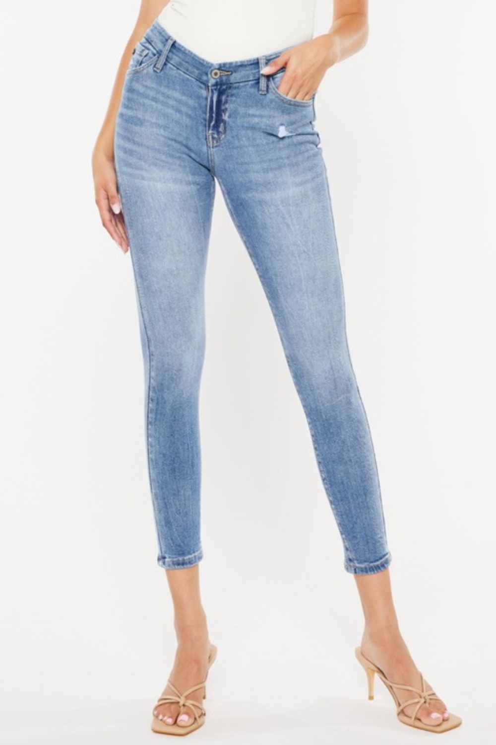 High Waist Cat's Whiskers Skinny Jeans with vintage distressing and classic denim wash.