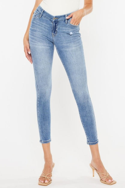 High Waist Cat's Whiskers Skinny Jeans with vintage distressing and classic denim wash.