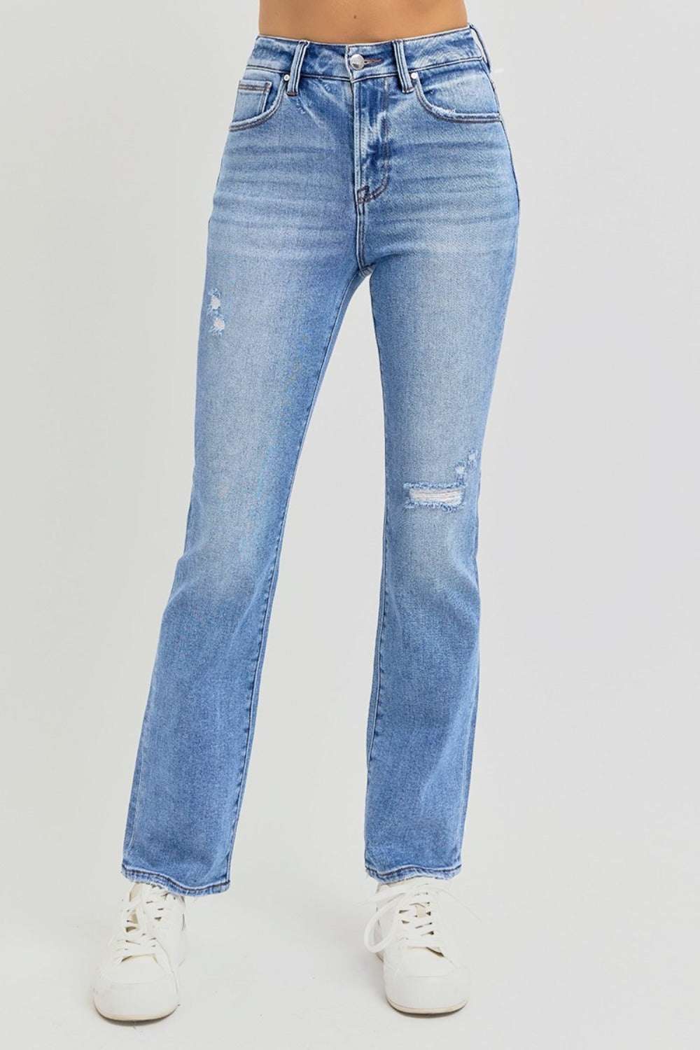Distressed high-rise ankle straight jeans with pockets, slightly stretchy fabric, in light blue denim.