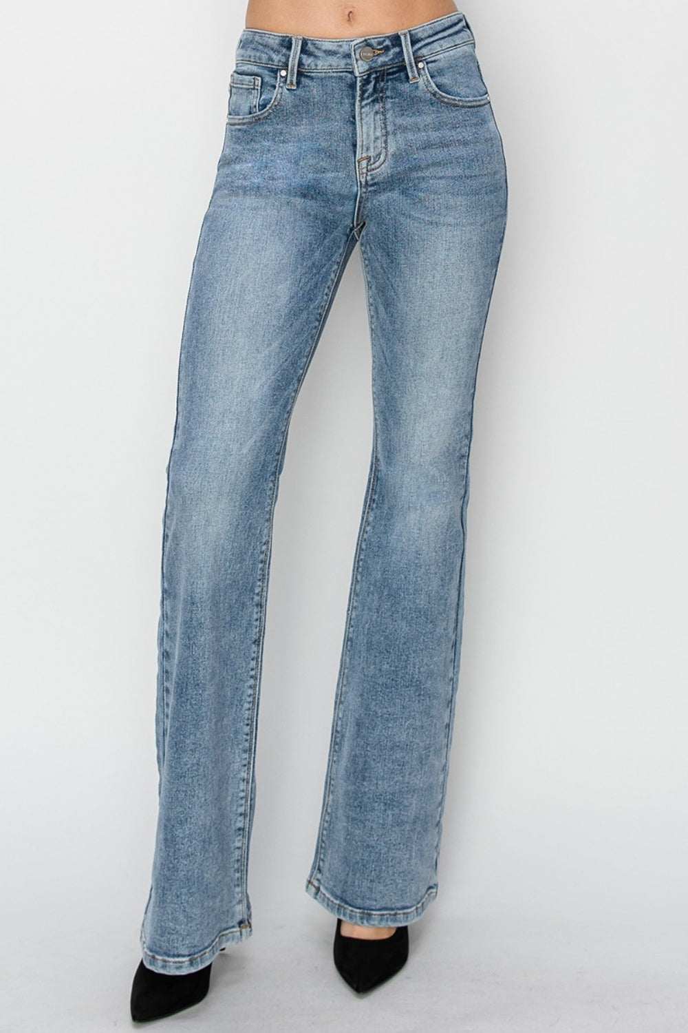 Full size mid-rise bootcut jeans with slightly washed finish and classic silhouette.
