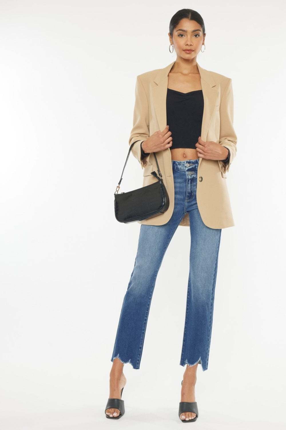 Kancan High Rise Wide Waistband Slim Straight Jeans with frayed hem in medium stone wash.