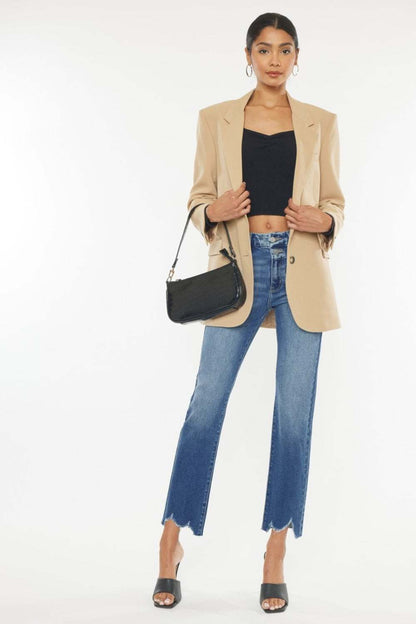 Kancan High Rise Wide Waistband Slim Straight Jeans with frayed hem in medium stone wash.