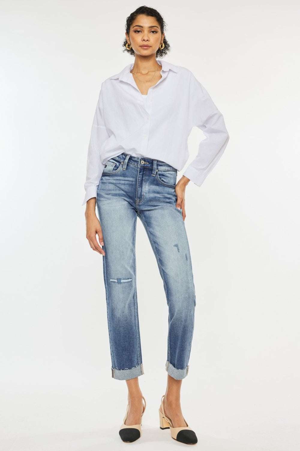 High-rise cuffed straight jeans with a flattering fit and casual charm.
