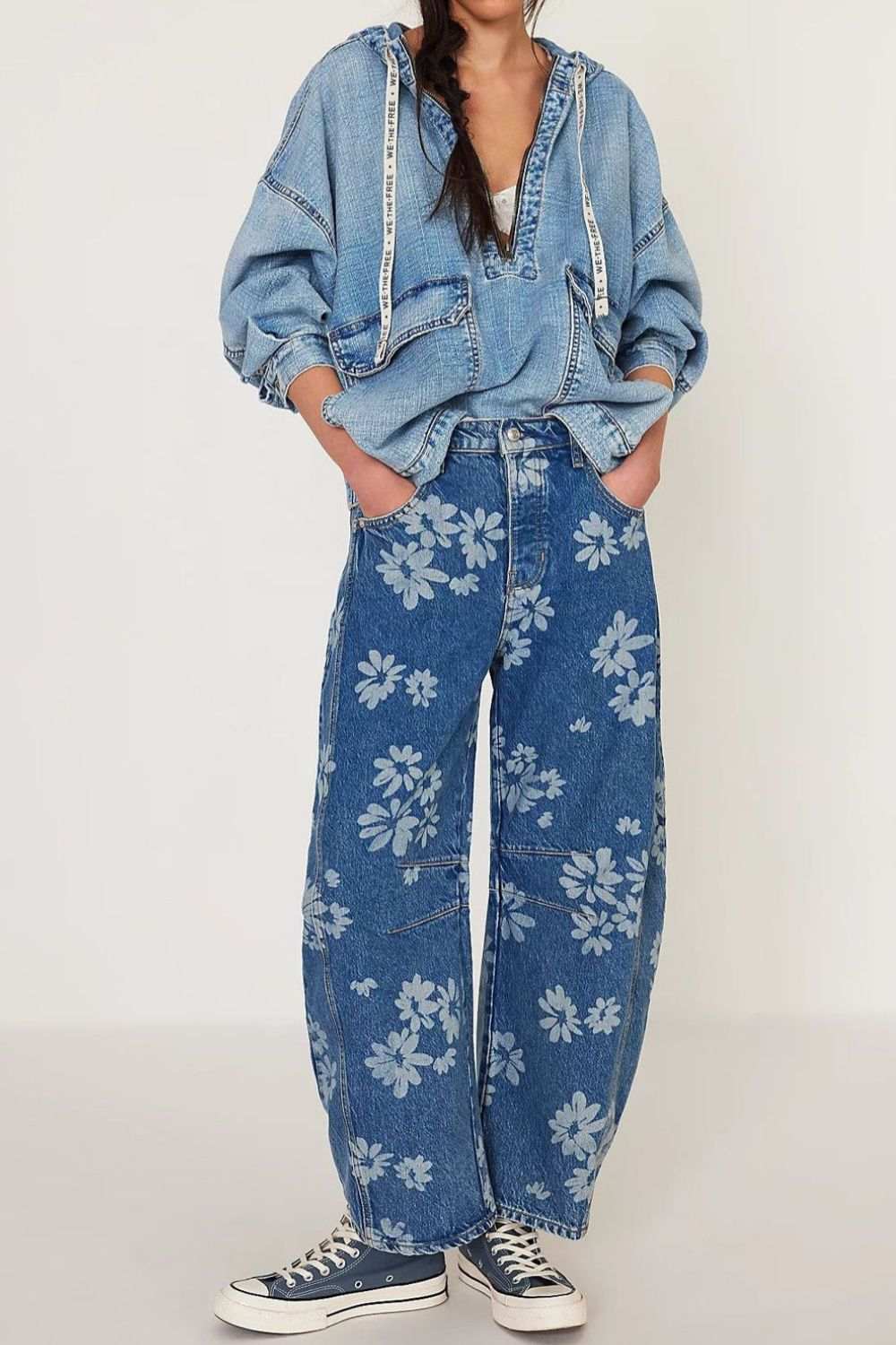 Flower print wide leg jeans with pockets, featuring no stretch material.