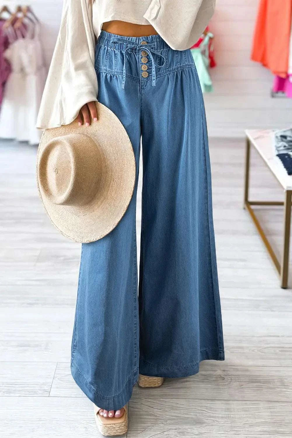 Wide leg jeans with drawstring waist, 100% cotton, no stretch, perfect for casual style.
