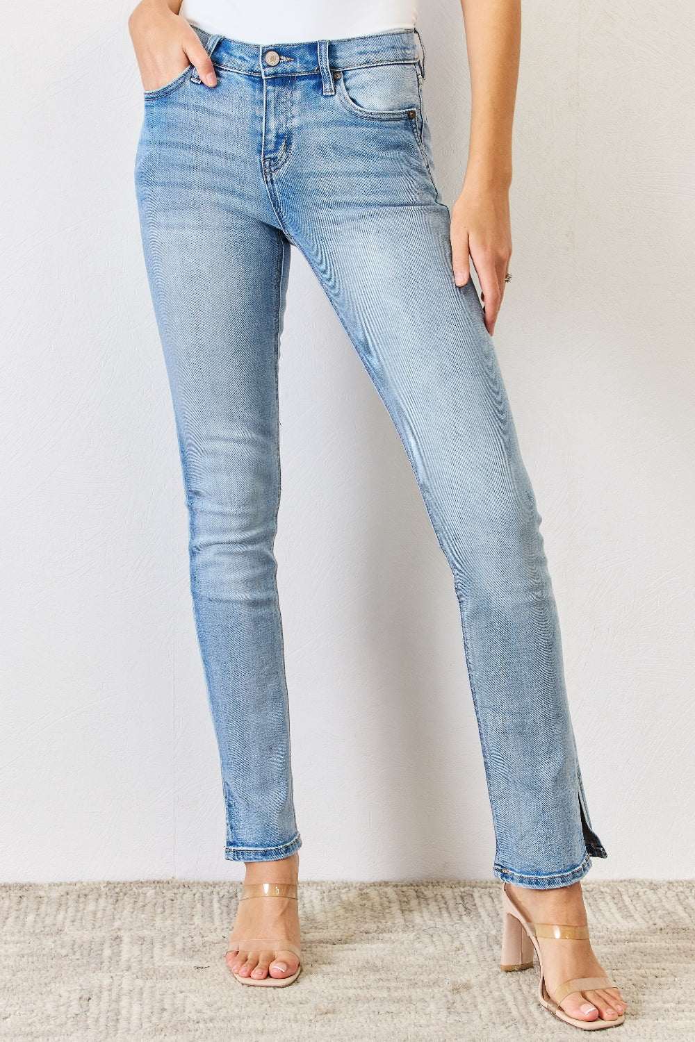 Kancan Full Size Mid Rise Y2K Slit Bootcut Jeans with side slit and zip fly.
