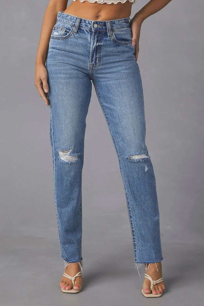 Distressed raw hem straight jeans with pockets and moderate stretch.