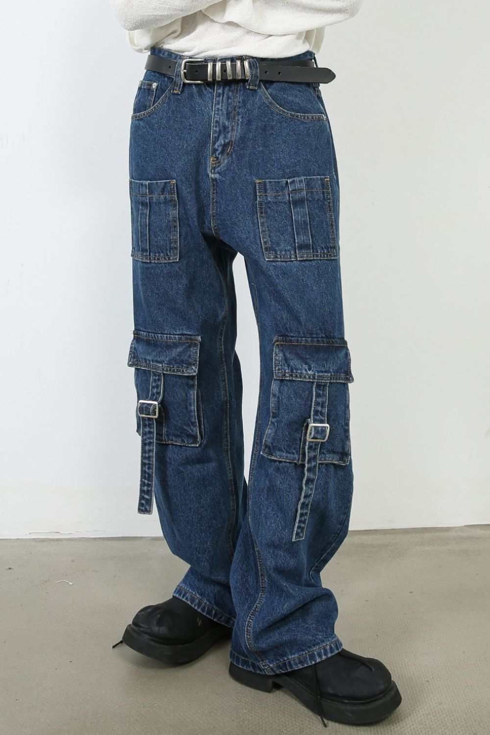 Men's mid rise jeans with cargo pockets and no stretch.