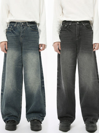 Men's washed wide leg jeans with relaxed fit, shown in blue and black options.