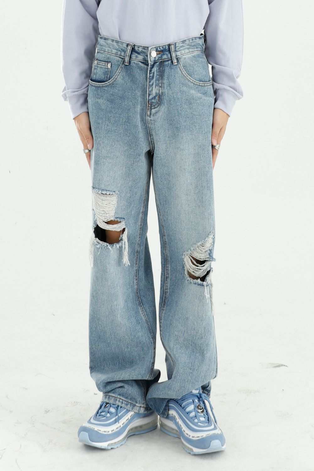 Distressed wide leg jeans with pockets, no stretch, cotton-polyester blend.