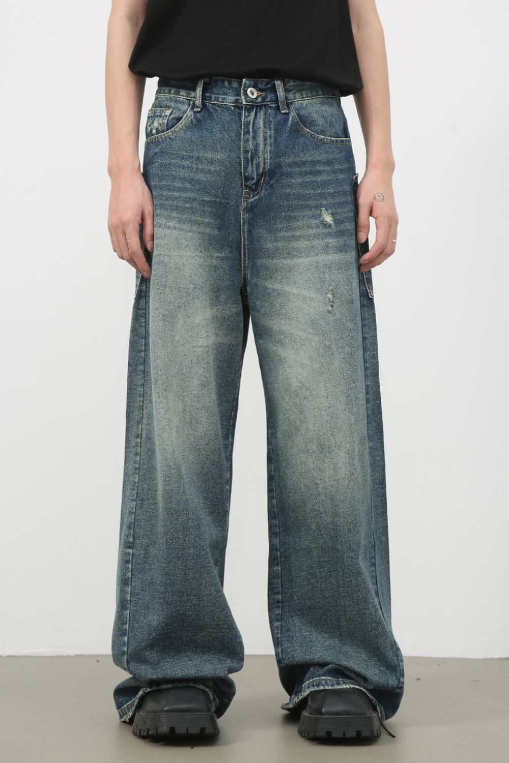 Men's distressed detail wide leg jeans with no stretch and basic style.