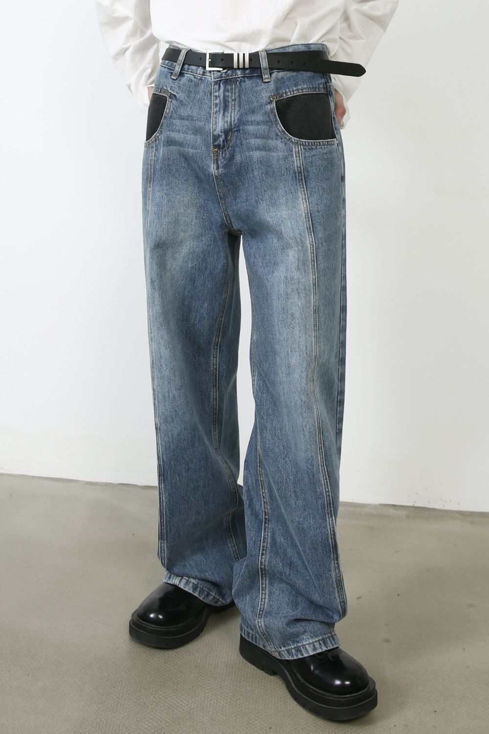 Men's mid rise jeans with pockets, no stretch, cotton blend, basic style.