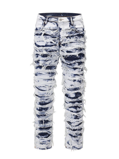 Men's distressed raw hem straight jeans in blue with rugged design.
