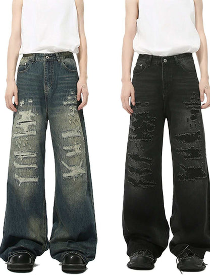 Distressed wide leg jeans with no stretch in blue and black, featuring a basic distressed style, made of 68% cotton and 32% viscose.