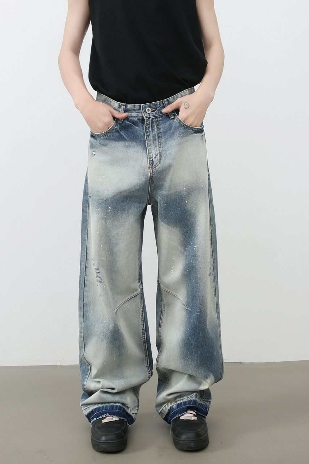 Men's Distressed Wide Leg Jeans with no stretch, cotton blend.
