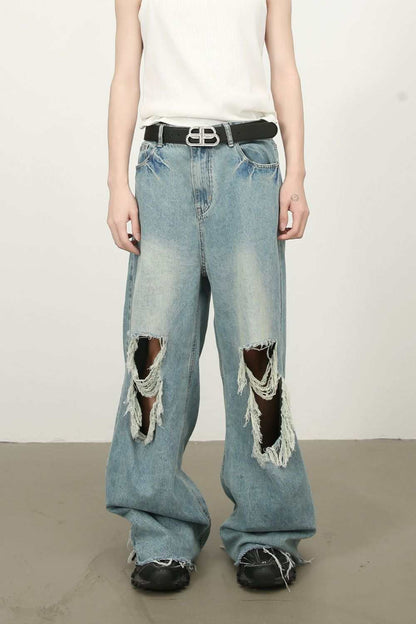 Men's raw hem distressed jeans with no stretch, featuring cotton, viscose, and polyester blend.