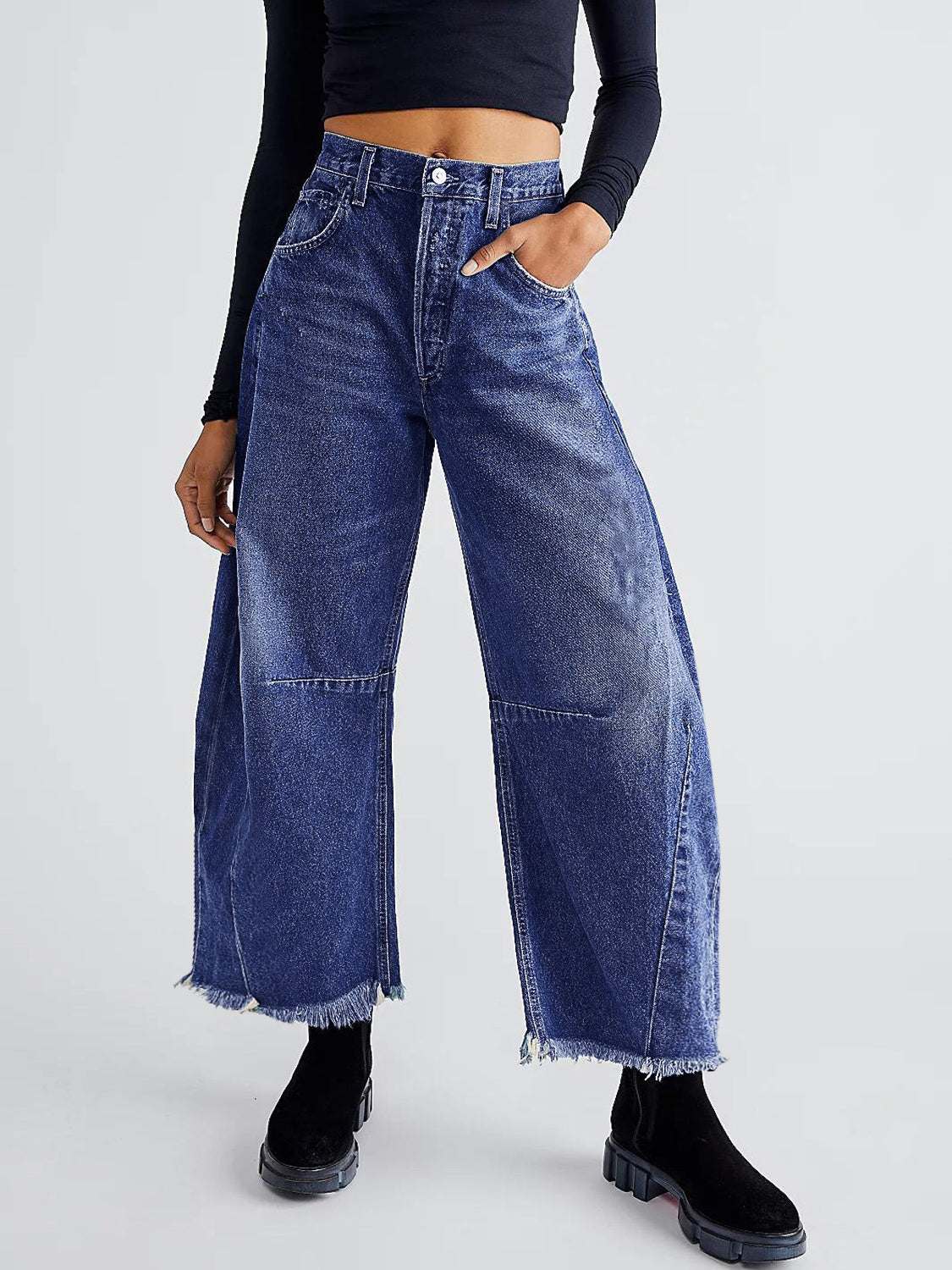 Raw hem wide leg jeans with pockets and no stretch.