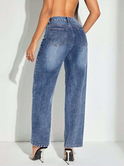 Contrast patchwork straight jeans with pockets, slightly stretchy, back view.
