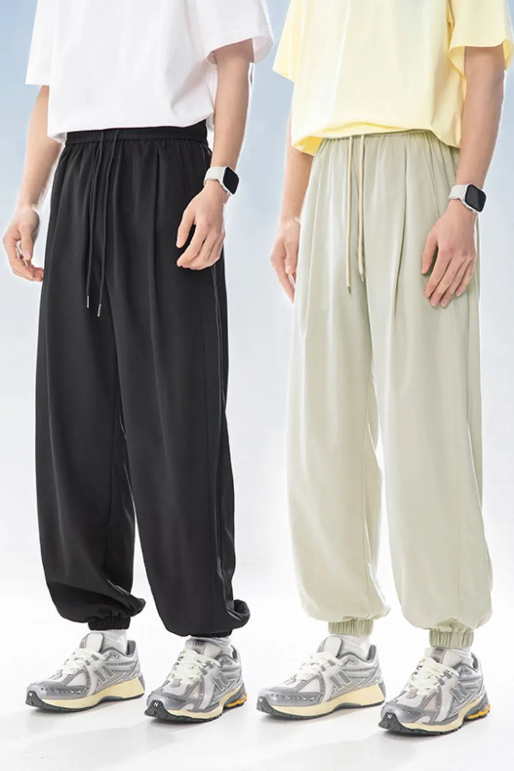 Men's Plus Size Drawstring Loose Fit Pants in black and beige, relaxed fit, adjustable waist.