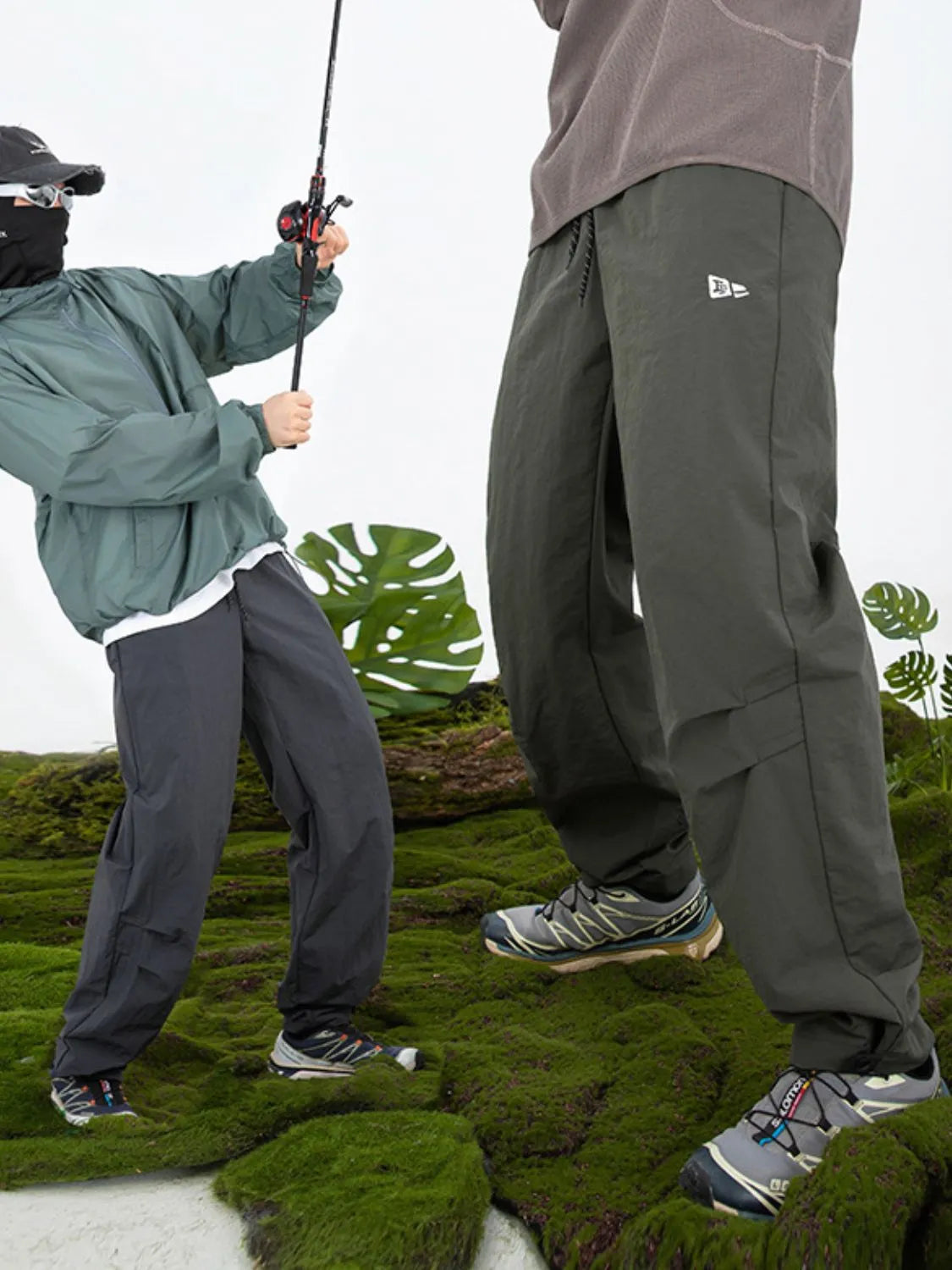 Men's plus size drawstring pants with pockets in outdoor setting.
