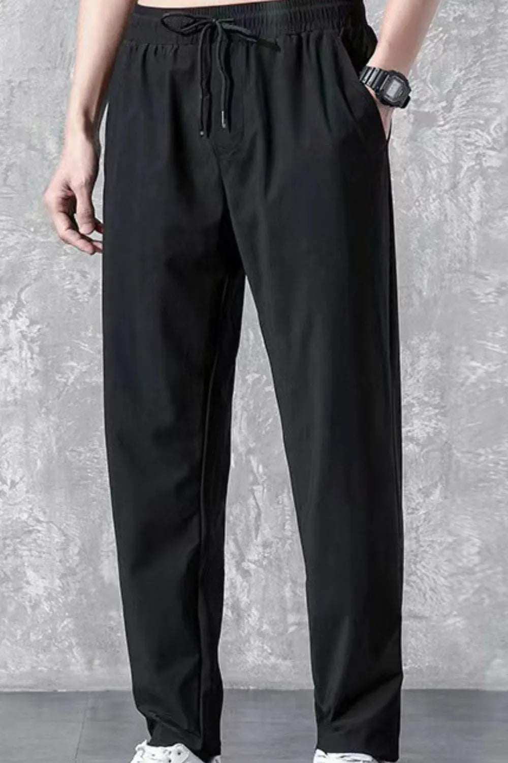 Men's plus size black drawstring pants with pockets, basic style.