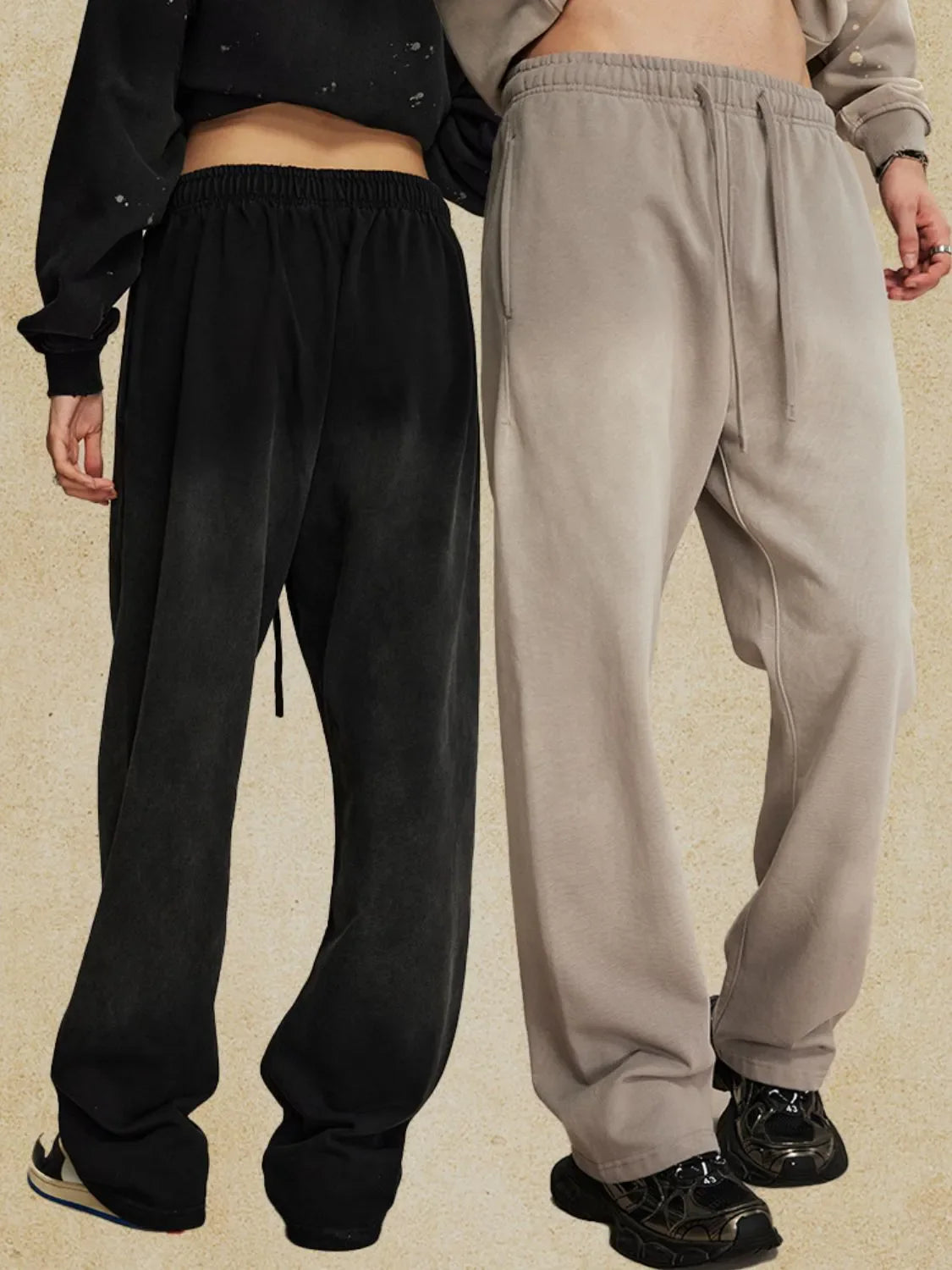 Men's drawstring baggy pants in black and beige, featuring basic style and relaxed fit.