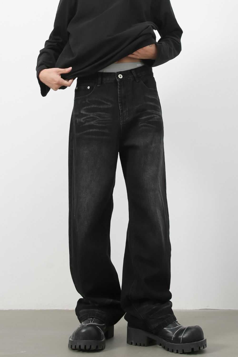 Men's Wide Leg Jeans with cat's whisker detailing, styled for basic fashion.