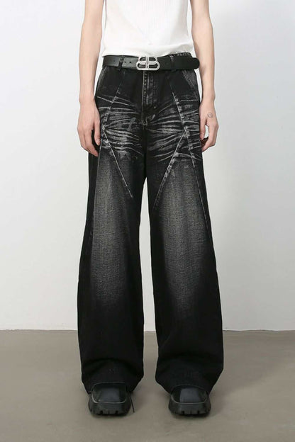 Men's wide leg jeans with pockets, cat's whisker detail, washed black finish.
