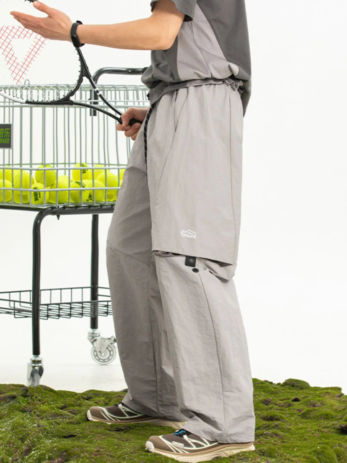 Men's plus size drawstring pants with pockets in nylon fabric.