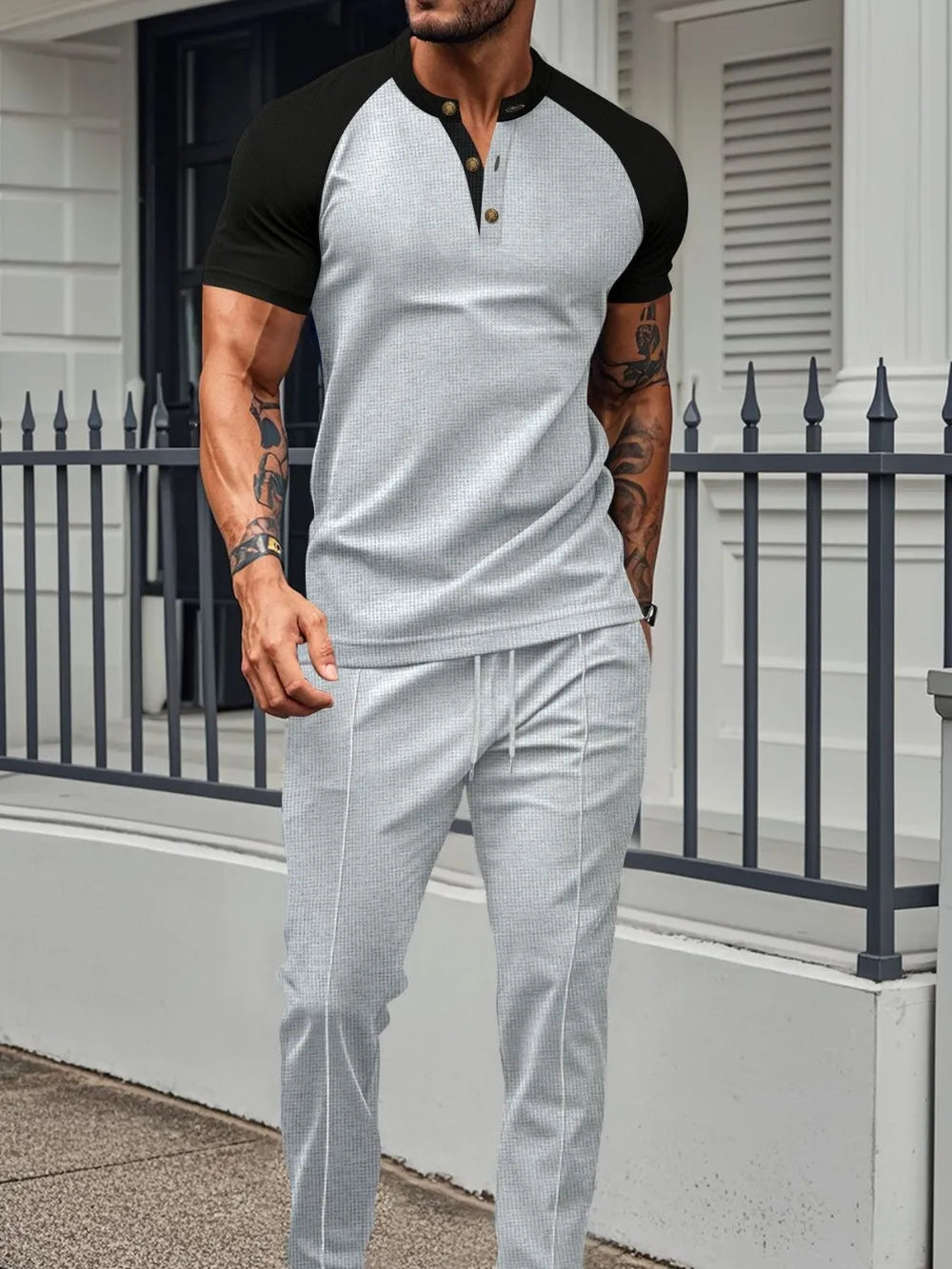 Men's full size waffle-knit contrast top and drawstring pants set in gray and black.