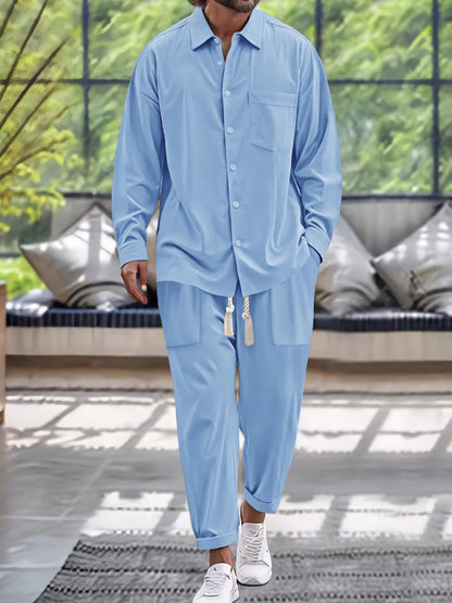 Men's button down long sleeve shirt and pants set in blue, 100% polyester, basic style.