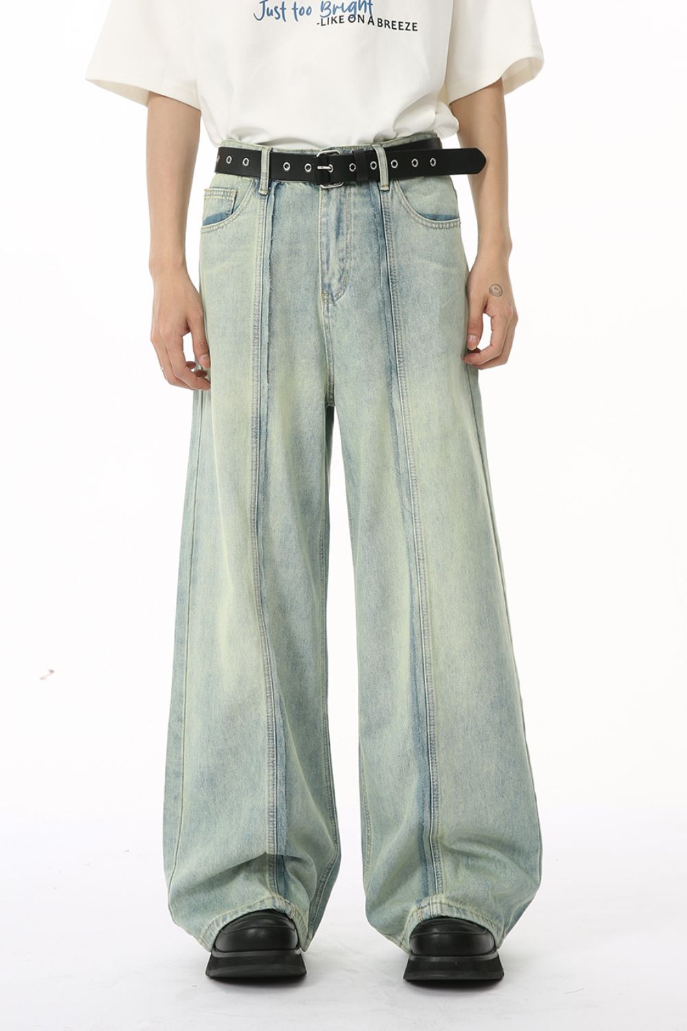 Wide leg jeans with pockets, no stretch, cotton blend, front view.