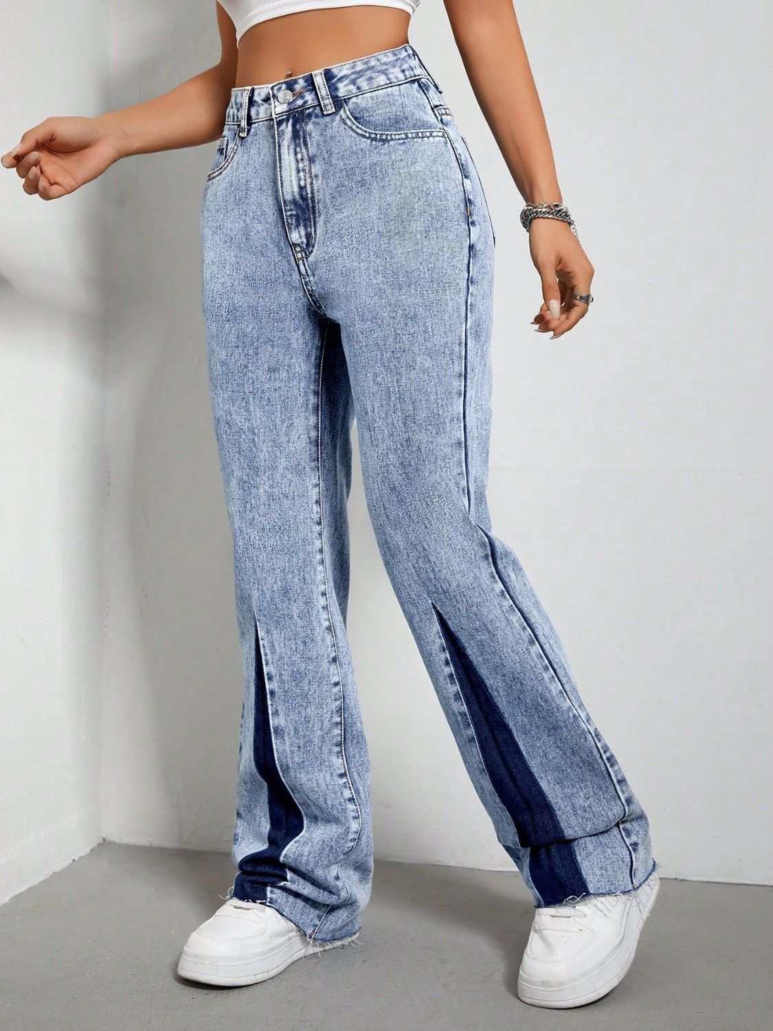 Contrast Bootcut Jeans with Pockets in light wash denim, slightly stretchy material.