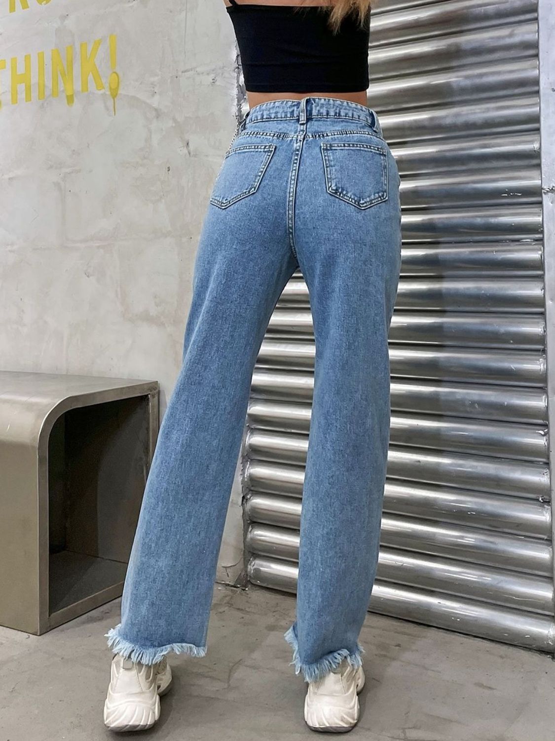 Raw hem jeans with pockets, back view, no stretch denim, casual wear.