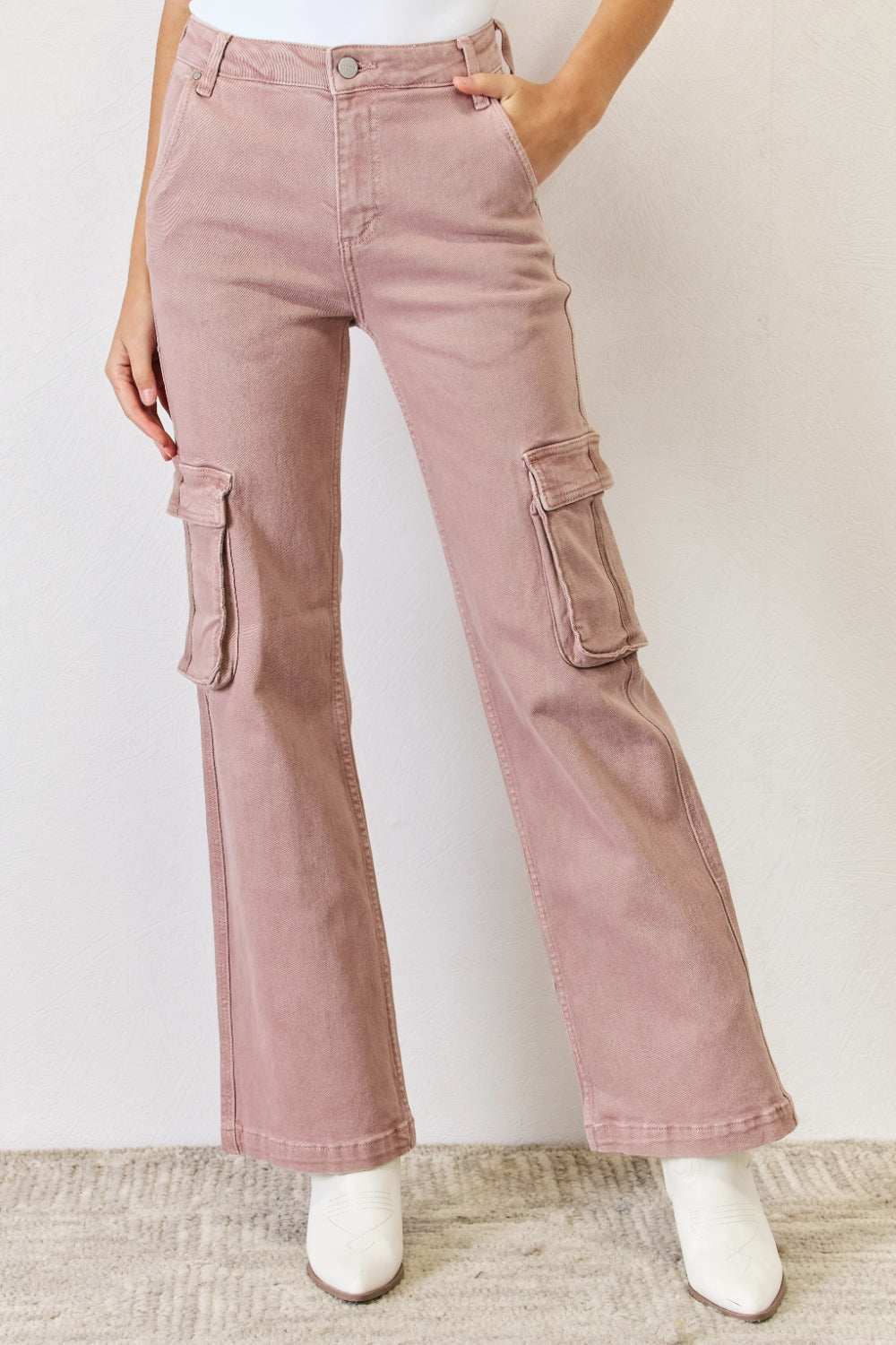 Full size high rise cargo wide leg jeans with functional pockets in a light mauve color.
