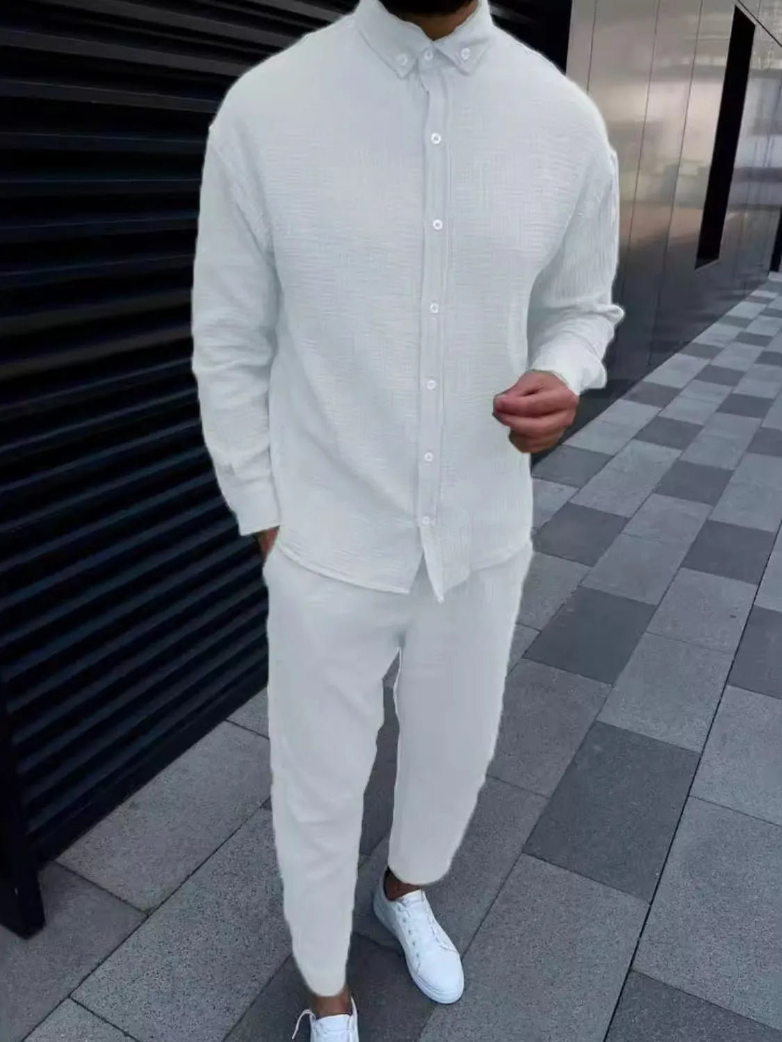 Men's button down long sleeve shirt and pants set in white.