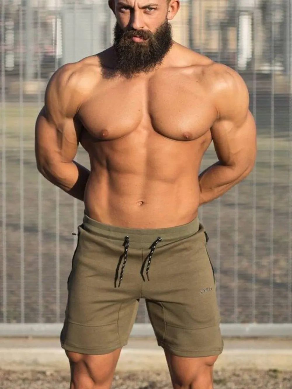 Men's plus size drawstring shorts in green color, basic style, suitable for casual wear.
