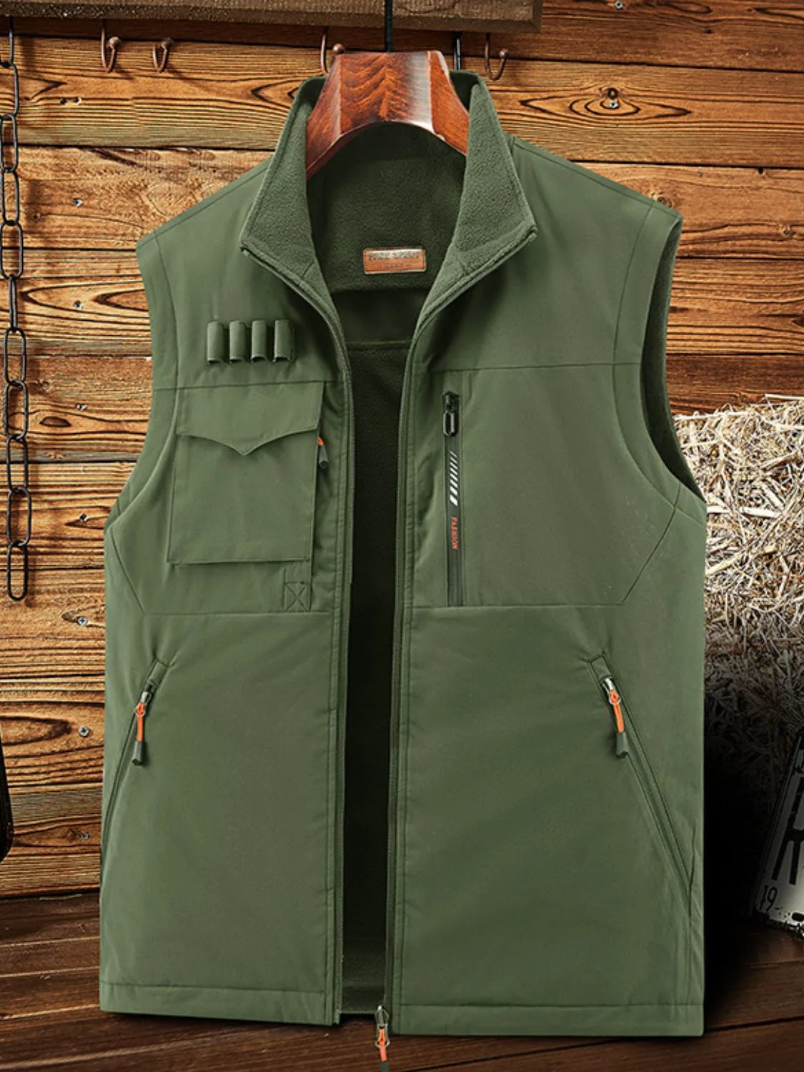 Men's plus size zip up vest in green, featuring basic style and slightly stretchy polyester material.