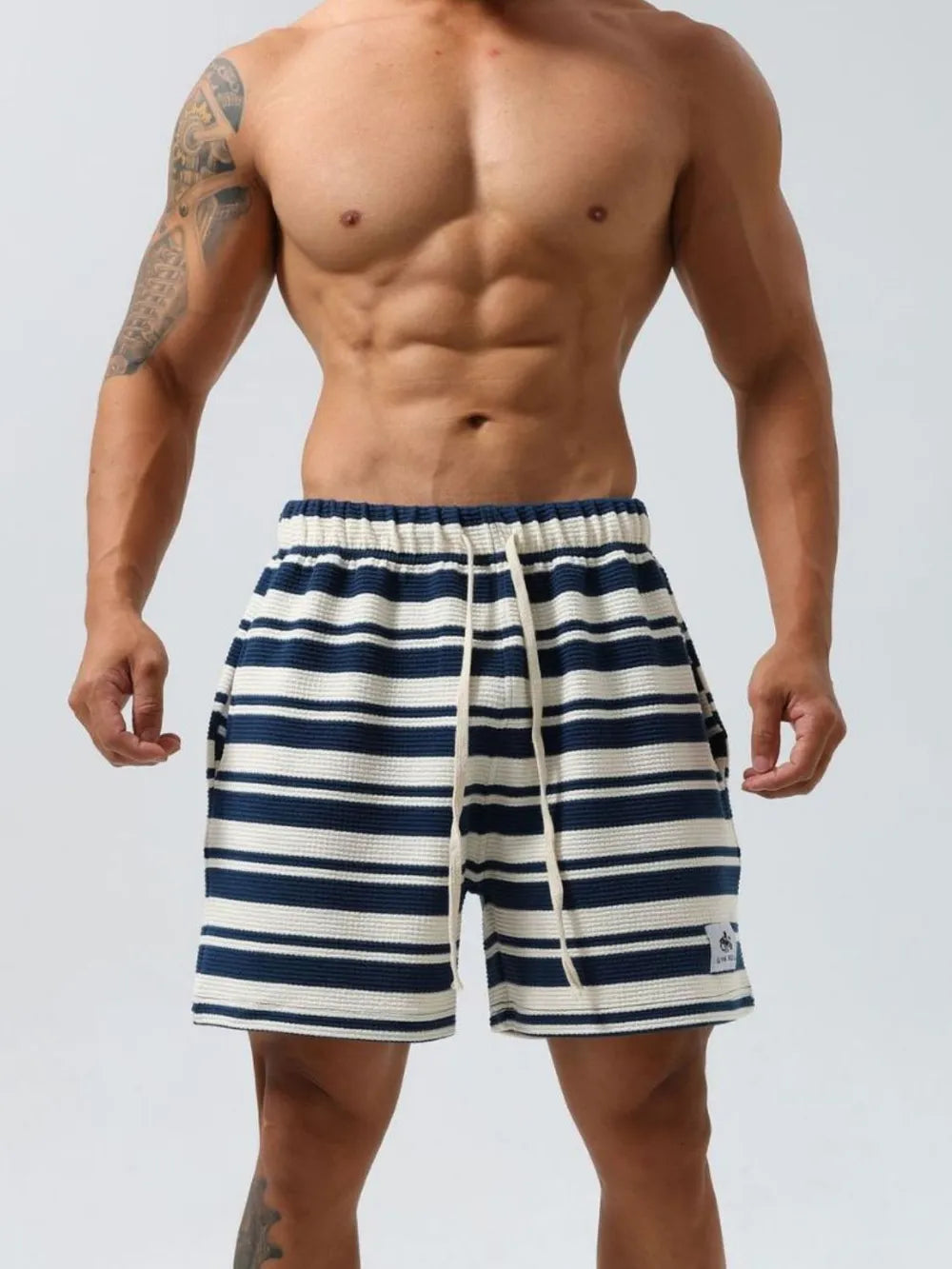 Men's plus size drawstring striped shorts in navy and white.