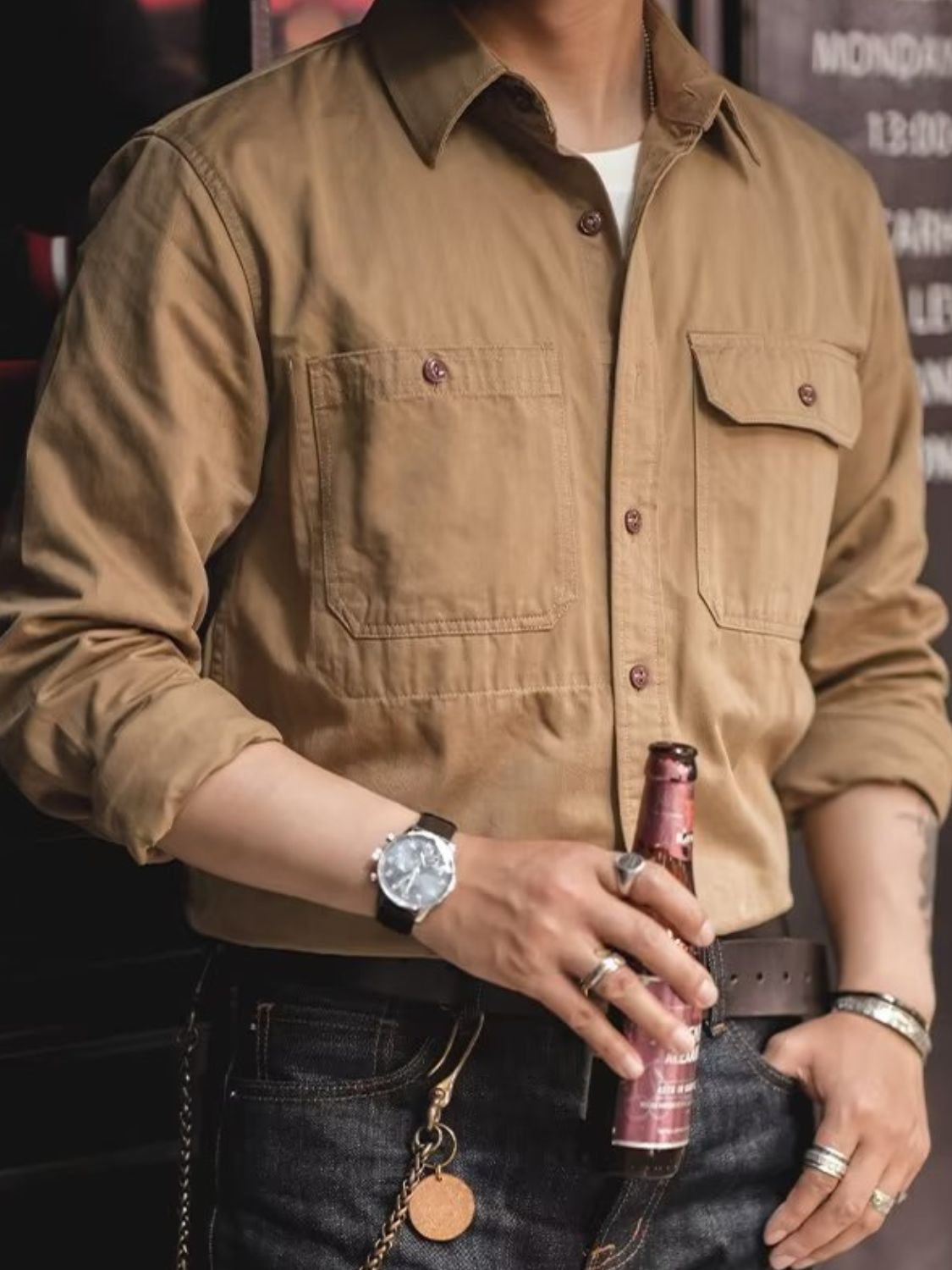 Men's button down long sleeve shirt with chest pockets, slightly stretchy cotton-polyester blend.