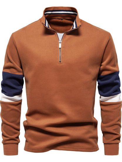 Men's color block long sleeve polo with zipper collar in brown, navy, and white; slightly stretchy cotton-polyester blend.