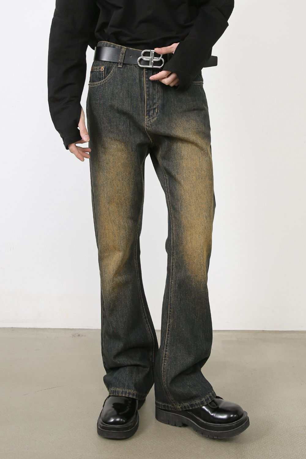 Men's washed bootcut jeans with a basic style, made from cotton, viscose, and polyester blend.